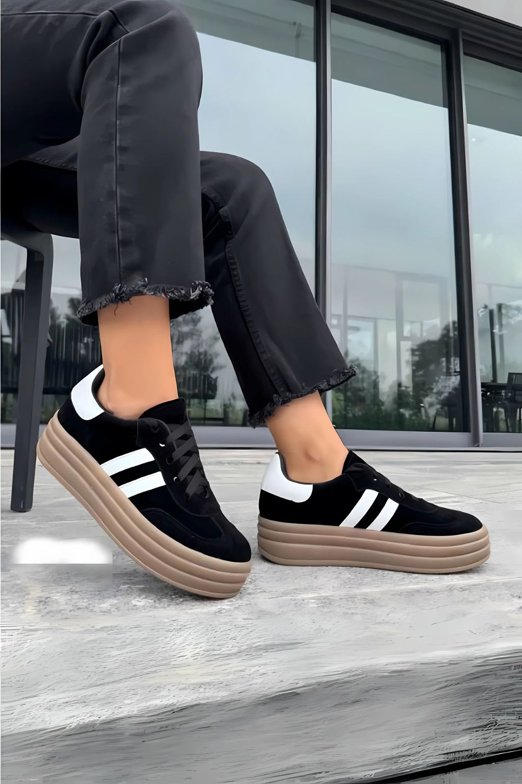 Black chunky sneakers by Slakim